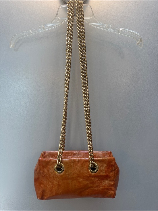 henri bendel Handbags - Henri Bendel Distressed Orange Leather Shoulder Bag with Gold Chain Straps